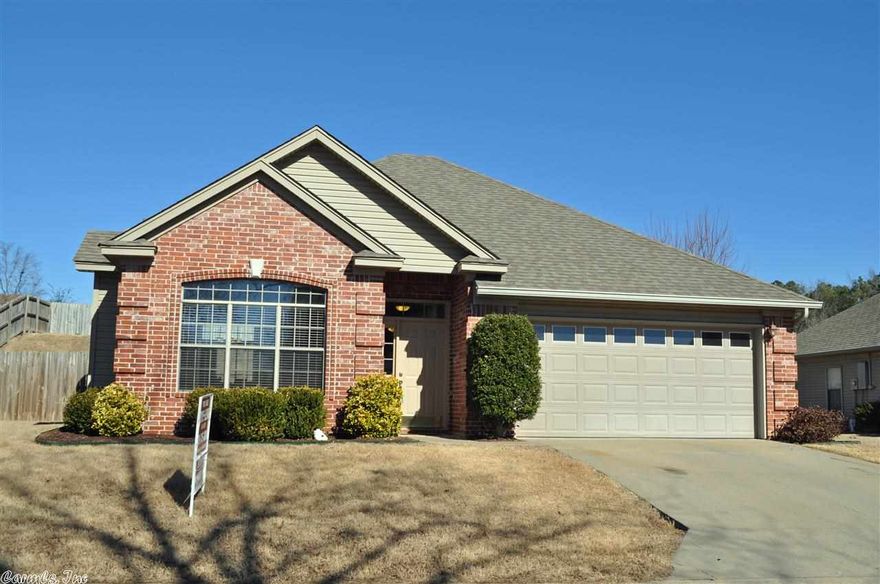 Adorable home!! Hardwood floors in greatroom and hallway.  Brick front with brick quoins on corners add to street appeal.  Cul-de-sac location.  Freshly painted and new carpeting.  Privacy fenced back yard with covered porch in back.  Conveniently located in close proximity for commuters.  Close to shopping, restaurants and more!  Refrigerator, washer and dryer will stay with this one!  Master BR/Bath features a jetted tub, separate shower and large walk-in closet.  Greatroom boasts 10' ceilings