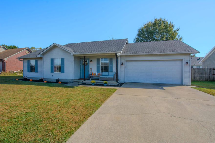 This Super Cute one level home is move in ready.  LVP floors in main areas, carpet in bedrooms.  Three bedrooms, two  bath, eat in kitchen, oversized garage, and a large backyard.  Backyard is divided, so ideal for pets and still have an area for kids to play.  This home sits on a quite circle drive street.  Maintanance free vinyl siding. New AC in 2023, New roof in Dec 2022, New stove and dishwasher in 2019