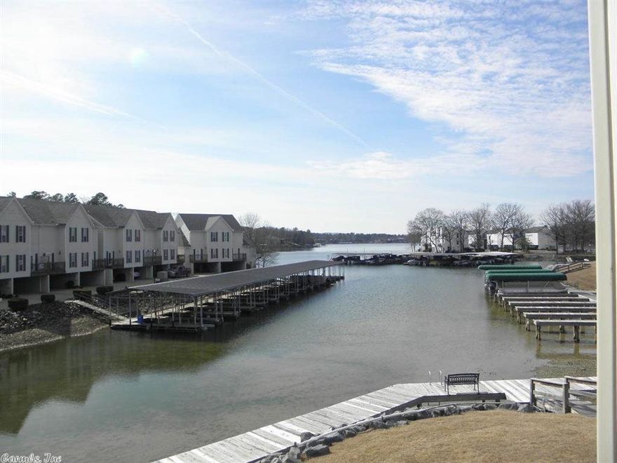 Like new 3/2 lakefront condo is perfect lake getaway or a fantastic rental opportunity. Bright and open floorplan w/ wood floors, builtins, high end kitchen w/ granite & ss appliances. Master suite w/ lake views and access to patio. Great gated community with club house, pool, picnic areas & fantastic boardwalk.