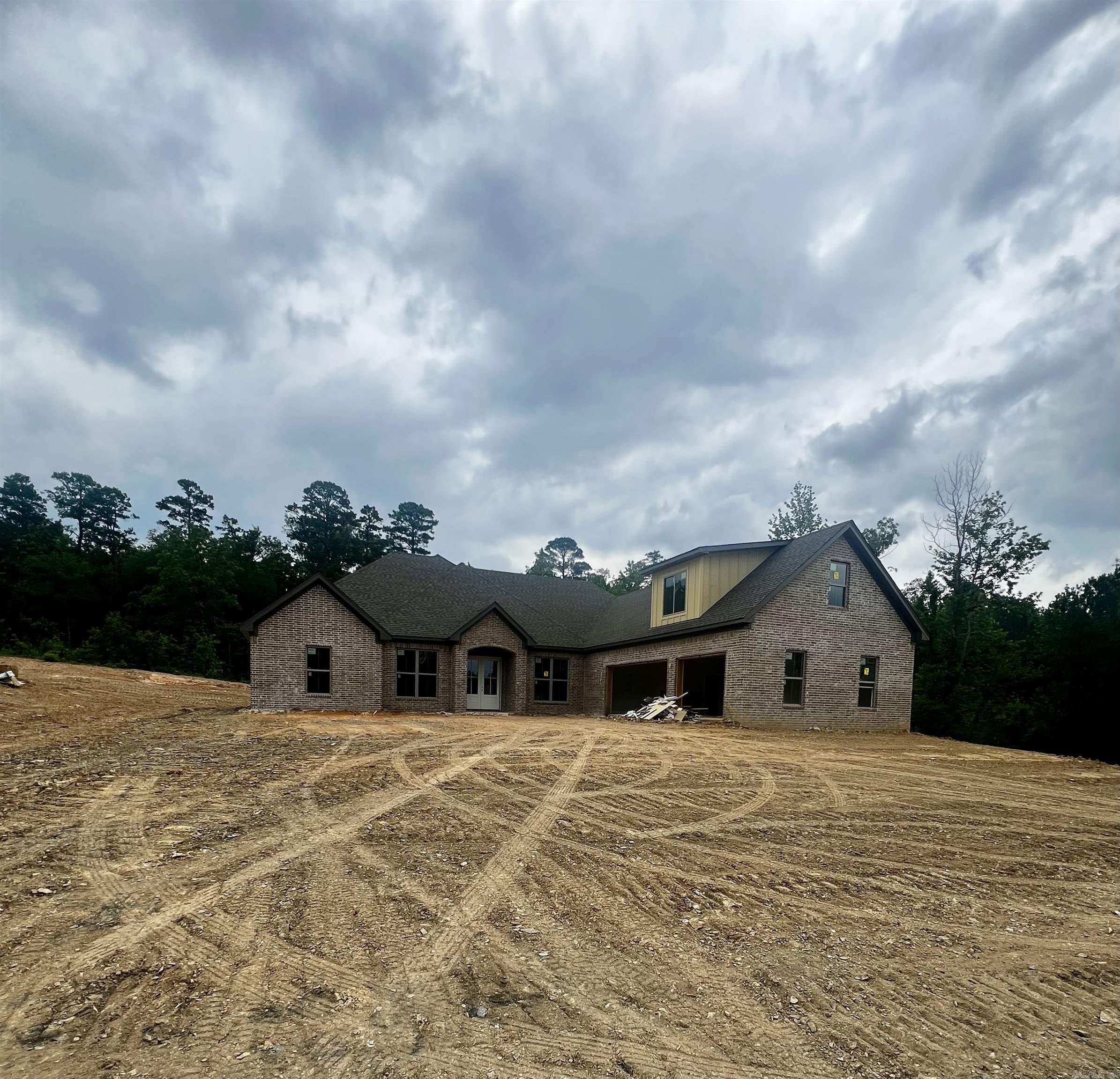 There is nothing not to love about this stunning new home. Located in the highly desirable gated Charleston Place development that is conveniently located in the Avilla community. This open plan includes gorgeous wood beams, centered fireplace and an unbelievable kitchen with quartz tops and chef's appliances. The spacious primary suite includes an incredible bath and closet space that leads directly into the laundry area. Generous sized guest suites, large bonus room and so much more. Agents see remarks.