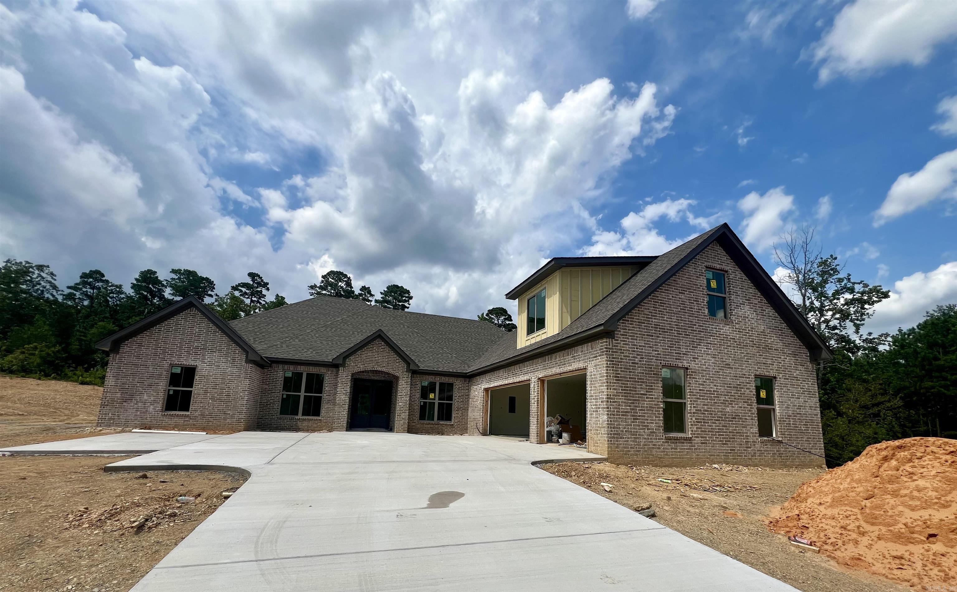 There is nothing not to love about this stunning new home. Located in the highly desirable gated Charleston Place development that is conveniently located in the Avilla community. This open plan includes gorgeous wood beams, centered fireplace and an unbelievable kitchen with quartz tops and chef's appliances. The spacious primary suite includes an incredible bath and closet space that leads directly into the laundry area. Generous sized guest suites, large bonus room and so much more. Agents see remarks.