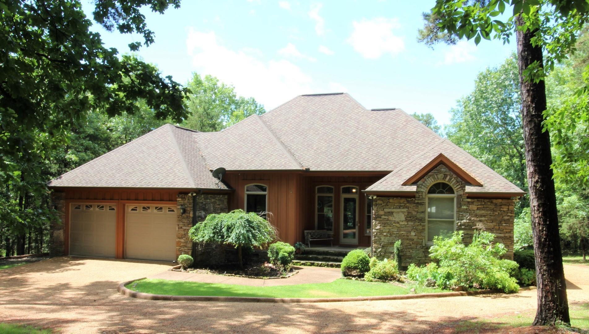 Lakefront with Easy Access to shoreline. Custom built 2001. 2 Car Garage, Screen Porch, Large Lakeside Deck, Turf back yard, gentle slope to the water just a few of the many amenities this unique lake home offers. Multiple Living areas with 5 bedrooms & 3 baths allow for great entertaining and hosting your family and friends alike. Wood and Stone siding, quartz countertops, stainless steel appliances, Andersen Doors and Windows, hardwood floors plus many more wonderful finishes throughout the home. Close proximity to the golf course, boat ramps, recreation areas, air strip make it easy to get around in a golf cart or side by side. Would make a great full-time and/or vacation home!!!