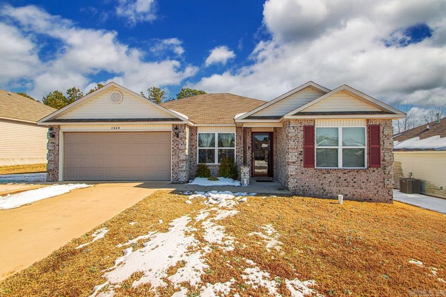Welcome home to 1040 Santa Fe Trail in Bauxite, where easy living and small-town charm meet just right. Built in 2020, this 4 bedroom, 2 bath home with 1,499 sq ft has been lovingly cared for and offers thoughtful upgrades that make it truly stand out! Inside you'll find a cozy, welcoming feel. Ceiling fans and, 2” wood blinds have been added throughou. Next, You’ll love the extended front driveway for extra parking, along with the privacy-fenced backyard—perfect for cookouts, kids, or pups. The heated and cooled, fully insulated garage is a rare find and ideal for a workshop, hobby space, or just staying comfortable year-round. Out back, the covered patio is just waiting for sweet tea evenings and quiet mornings. Security and storm doors add peace of mind! It may not be a brand new build, but this one defiantly has more to offer.   If you’ve been searching for a move-in ready home with charm, comfort, and just the right touches—this one feels like home the moment you arrive.