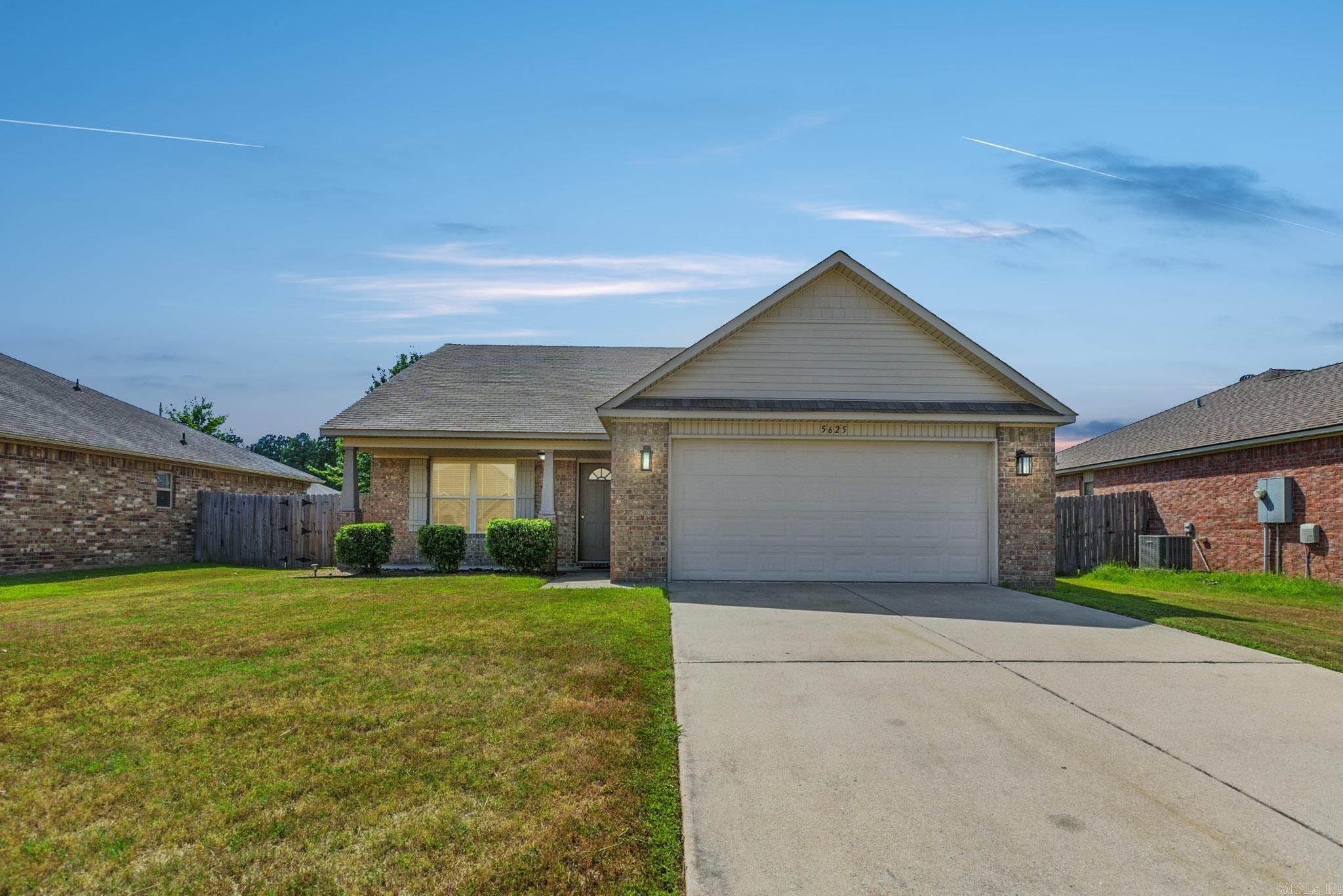 Discover modern comfort in this beautifully maintained 3-bedroom, 2-bath home with 1,471 sq ft of living space in the desirable Trammel Estates of Sherwoodājust 4 miles from McCain Mall. Step inside to an airy open floor plan filled with natural light, enhanced by ceiling fans and a stylish tray ceiling in the primary suite. The spacious primary bedroom also features a large walk-in closet for effortless organization. The gourmet kitchen is a true centerpiece, complete with stainless steel appliancesāincluding a range with smooth cooktop, dishwasher, deep double sinks with disposal, microwave, and an energy-efficient refrigerator with exterior ice and water dispenserāall included with the home. A convenient laundry room makes daily routines a breeze. This all-electric home combines safety and efficiency, offering an attached two-car garage and a fully fenced backyard for privacy and outdoor enjoyment. Nestled in a peaceful neighborhood with easy access to shopping, dining, and entertainment, this residence blends comfort and convenience in one perfect package. Schedule your private showing today and experience all that Trammel Estates living has to offer!