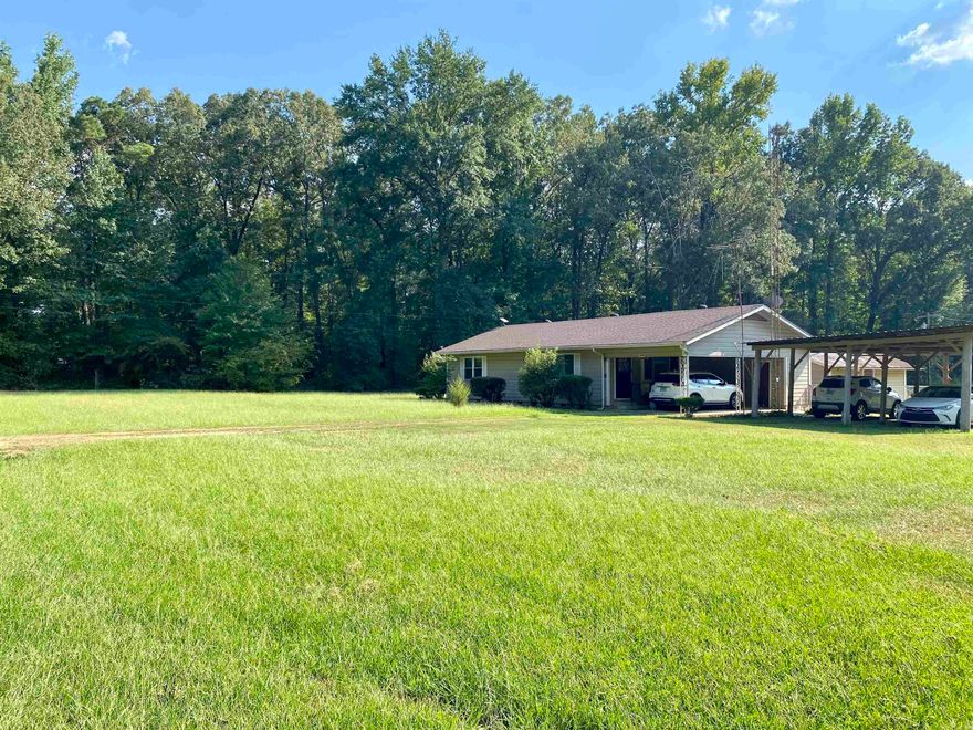 Charming MOVE-IN Ready Home in Cleveland County - Priced to SELL! This adorable 2-bed 1-bath home in Cleveland County has been completely remodeled and is truly move-in ready! Featuring a brand-new kitchen with granite countertops, soft-close cabinets, and recessed lighting. Open floor plan. LVP Flooring though out. New windows. Fully renovated bathroom. Covered back porch is perfect for relaxing. One-acre lot with a partially fenced backyard and a cute workshop. Enjoy the flexibility of optional school districts - choose between Star City SD & Woodlawn SD. Don't miss this one - it's priced to sell & won't last long!