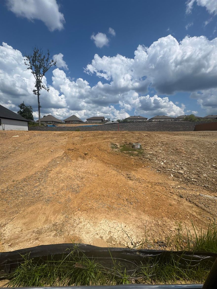 This lot offers a perfect place to build your ideal residence. It is a must see!