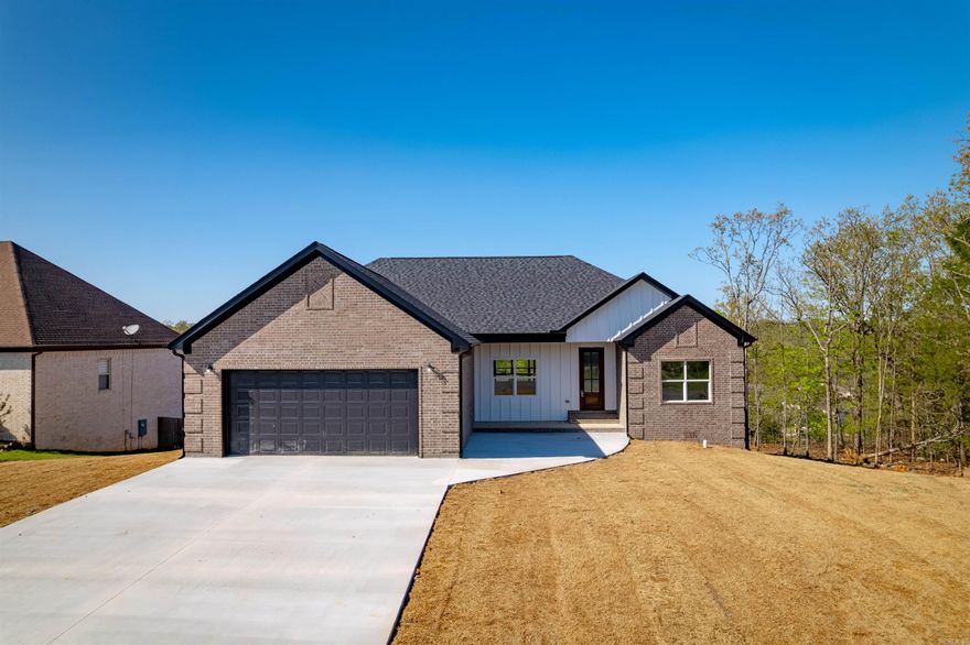 WELCOME HOME TO GREYSTONE'S WELLINGTON! Do you enjoy Golfing? Do you enjoy visiting with friends at the Country Club? Do you enjoy walking in a nice neighborhood? This house is positioned amidst all of these things! Enter the home on the main level (upstairs) w/3 bedrooms, 2 baths, an ultra open concept, 2 car garage, bonus storage above garage, covered front porch, & covered back deck. Downstairs enjoy the shop/cart garage, game room, 1-bedroom, bonus living room & 1-bathroom. This home will blend the modern & outdoors w/warm colors meeting modern neutral styles.