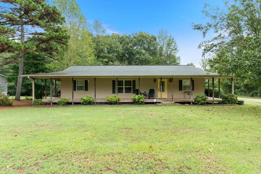 Beautifully maintained 3-bedroom, 2-bath home with an expansive covered back deck perfect for year-round relaxing and entertaining. The inviting kitchen features a gas range, large island with farmhouse sink, and warm wood ceilings that add style and character. Recent upgrades include new attic insulation and a fully encapsulated foundation for comfort and efficiency. Located just 2 miles from access to the Little Red River and 6 miles from Greers Ferry Lake, this home puts fishing, boating, and outdoor adventures within easy reach.