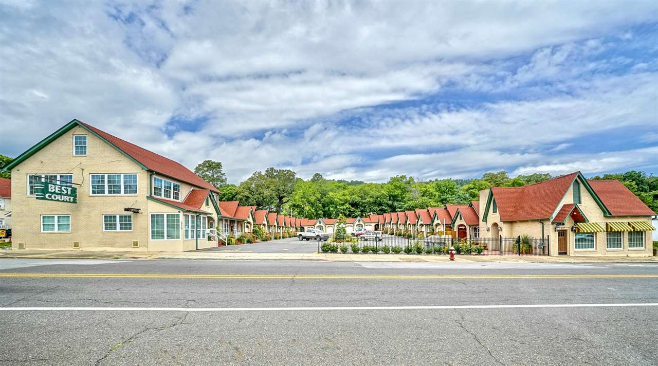 This is one of the finest historic renovations you'll ever see! The Best Court has been hosting vacationers to Hot Springs National Park since 1933, and the current owners have completely restored it back to its former glory. The quality and attention to detail are incredible. Property consists of 21 (separately metered electric) "cottages" with garages between, plus 2 separate apartments for Owner and Manager living. Also included is the highly rated and renovated Best Cafe with its new commercial kitchen!