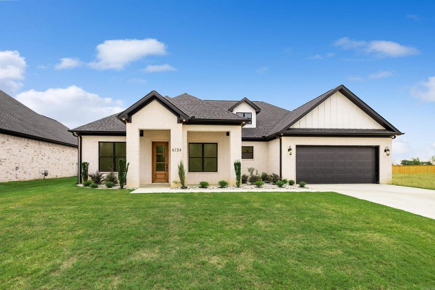 Discover modern living in this nearly completed new construction home! Featuring 3 bedrooms, 2.5 baths, and an inviting open-concept design, this residence is brimming with upscale details. From the light and natural color scheme to the warmth of the wood accents- this home is ready for your personal touches. Enjoy cooking in a gourmet kitchen equipped with quartz countertops, a walk-in pantry, and all-natural gas appliances. The office off the entry adds function, while LED lighting enhances every space. Retreat to the primary suite with a pass-through laundry to the master closet, split vanity with ample storage, a luxurious free-standing tub, and a walk-in shower. Located in a vibrant neighborhood close to everything and within Bryant Schools, you’ll also enjoy access to amenities like a pool, splash pad, tennis and pickleball courts, lake access, and year-round community events. Schedule your private tour today and make this your dream home!