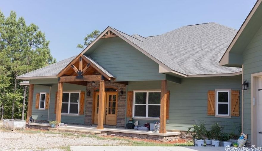 This  New Construction home sits on beautiful and peaceful (approx.) 27 acres. with a year round creek.  Its located just minutes from Jessieville school and less 10 minutes from shopping and restaurants. This home has the total of 4200 under roof space including garage and porches and approx. 2900 sqft of heat n cooled space. It can be a 4 or 5 bedroom or 5th can be office or dining. Kitchen and baths have quartz counter tops and raised cabinets, kitchen aid appliances, gas range, coffee bar. Being sold AS IS NO REPAIRS