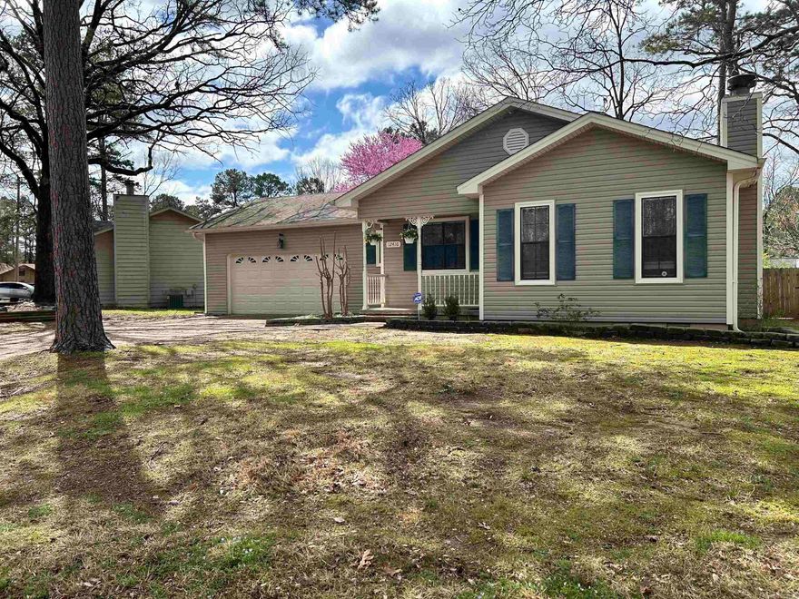 This beautiful 3 bed, 2 bath home with 2 car garage sits on .18 acres with a fully privacy fenced backyard that features a raised garden bed and spacious 2-level deck with pergola perfect for relaxing and family time. This home is in a quiet, deeply rooted, and walkable neighborhood that would be a great place to call home for the first-time homebuyer, downsizing families or newly relocating. The home has several updates. 2011, new siding, roof and heat and air unit. 2014, added a new Whirlpool stainless steel drop in electric range and Whirlpool stainless steel dishwasher. 2015, laminate wood floors in the living room, hall and main bedroom and new paint in bedrooms. 2022, new gas water heater. 2024, new Pergo laminate flooring in kitchen, dining, laundry, and bathrooms. New paint in living room, kitchen, laundry, and bathroom. Kitchen cabinets are updated with new paint and hardware. The gas log fireplace has been serviced. The vinyl siding has been pressure washed, gutters cleaned, and the home includes a sprinkler system. Located 3 min away from all things shopping and entertainment.