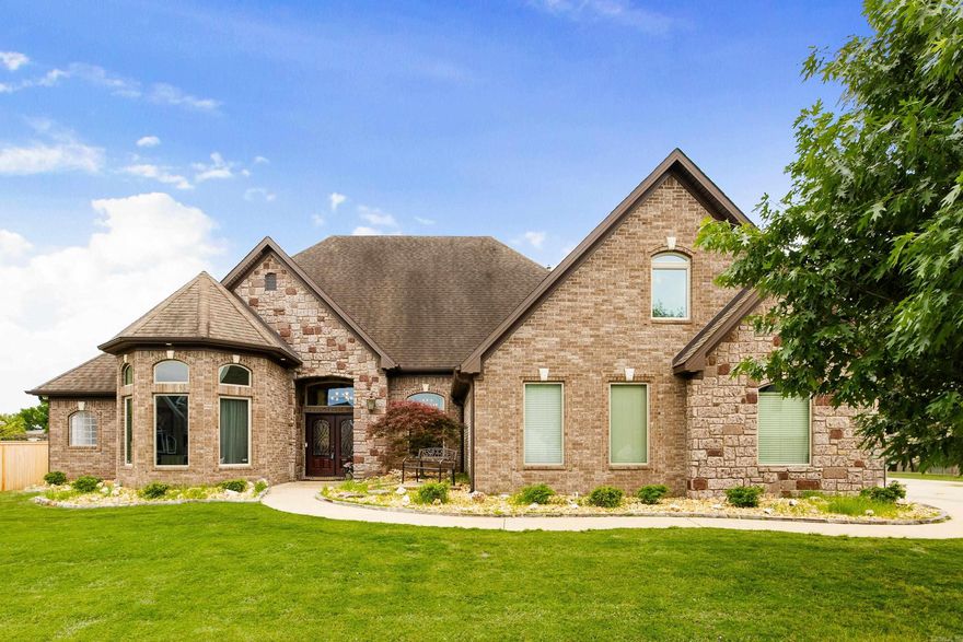 Tucked inside gated Westshore at Hurricane Lake Estates, this beautifully designed home offers timeless elegance and exceptional functionality. Soaring ceilings, stunning crown molding, and a marble-surround gas fireplace create an inviting yet refined atmosphere. The chef’s kitchen features granite countertops, gas range, stainless steel appliances, center island, walk-in pantry, breakfast nook, and separate formal dining. The main level offers four bedrooms plus a dedicated office, including an impressive primary retreat with backyard access, dual walk-in closets, jetted soaking tub, and custom tiled shower, while two secondary bedrooms are connected by a Jack-and-Jill bath. Upstairs, the bonus room with full bath offers incredible flexibility for guests, media, or additional living space. Outside, enjoy a covered patio with pergola, fully fenced flat backyard, 3-car garage, sprinkler system, abundant extra parking, and a whole-home generator.