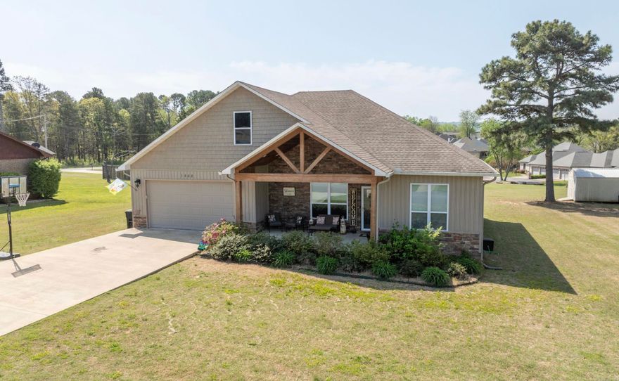 Welcome home to this well-maintained 3-bed 2-bath home built in 2018, offering a desirable split floor plan and thoughtful upgrades throughout. Enjoy a modern kitchen with granite countertops, a wine refrigerator, and ample storage. Relax in the large sunroom filled with natural light or cozy up beside a stunning stone fireplace in the living area. Entertain with friends or relax with a cup of coffee on either of the oversized front and rear covered porches. Additional features include a tankless water heater, a drip irrigation system, and energy-efficient design. Don’t miss this move-in ready home located minutes from Greers Ferry Lake and all that Heber Springs has to offer!