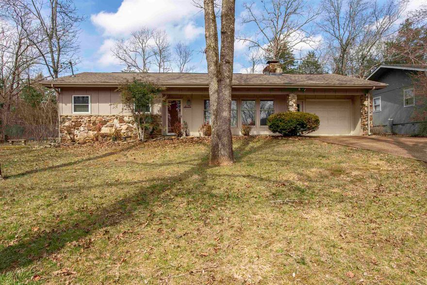 Located at 7 Winnebago Dr in Cherokee Village, Arkansas, this charming one-level home offers comfort, convenience, and proximity to **Lake Thunderbird**. Situated directly across from Wétapo Park, a public access point to the lake, this property provides easy access to fishing, kayaking, and relaxing by the water. The home even offers some seasonal lake views, adding to its appeal.  This 1,252 sq ft homefeatures 2 spacious bedrooms and 1.5 bathrooms, all on one level, plus a 2-car garage. Inside, you'll find a large living room, generously sized bedrooms, and an eat-in kitchen*with plenty of space for everyday meals. Step outside to enjoy the covered back patio, perfect for lounging or entertaining. Small fenced area for fur baby.  Major updates include a roof replaced in 2023 and HVAC installed in 2013. Located in the scenic community of Cherokee Village, residents enjoy access to 7 lakes, two golf courses, parks, and outdoor recreation,i included 2 recreational centers with in ground pool. Whether you're looking for a full-time residence, weekend vacation getaway, lake area home, or investment property, this location offers easy access to boating, fishing, golfing, and nature.