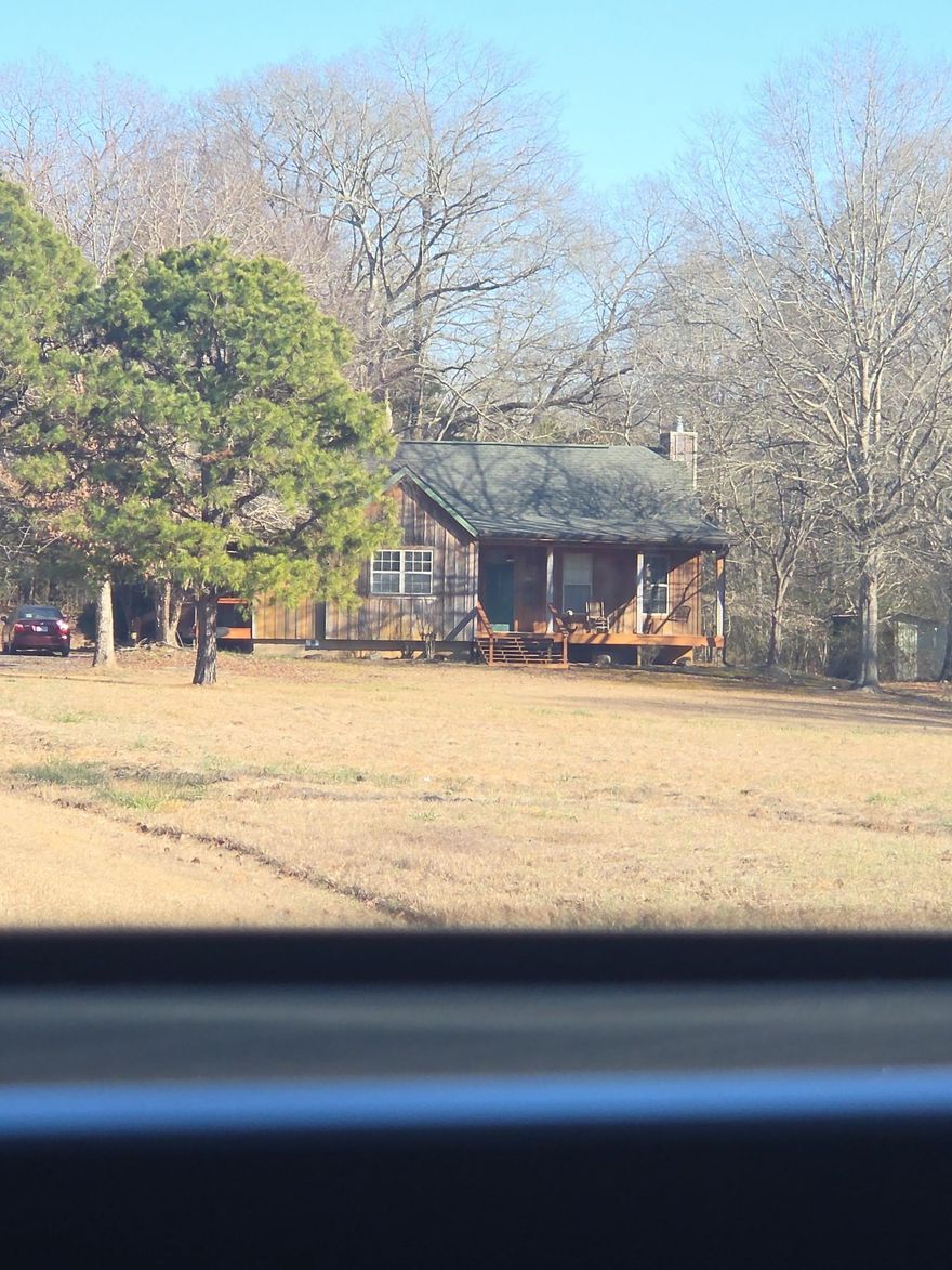 Beautiful retreat in Vilonia with acreage.