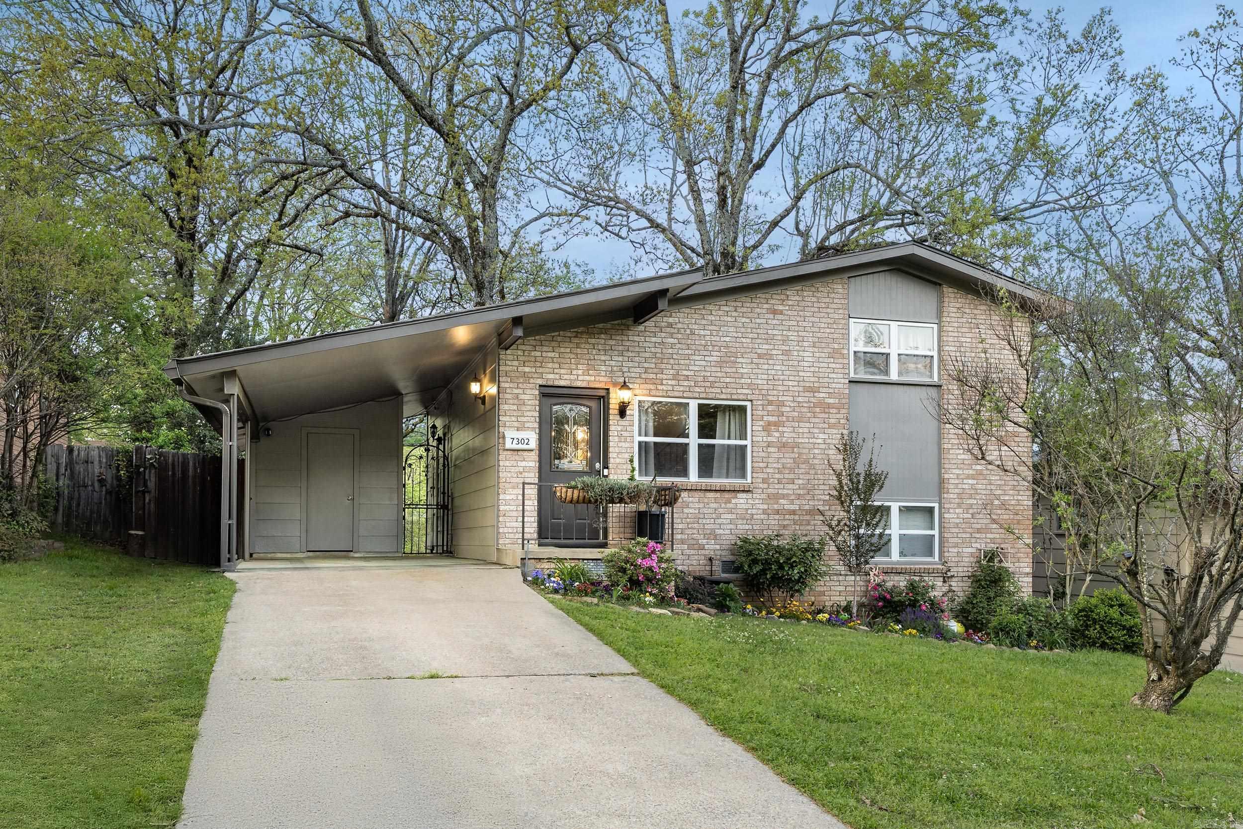 Don't miss this move-in ready 3-bedroom, 1.5-bath Midtown Little Rock charmer featuring a bonus den/playroom downstairs, fully fenced yard, and tons of updates including new flooring along with the original hardwood floors, fresh exterior paint, a beautiful kitchen with stainless appliances and butcher block countertops, new HVAC ducts, cleaned air vents, and a new hot water heater. Added landscaping both in front and back of the house makes this charmer one of a kind - all in a prime location close to everything!