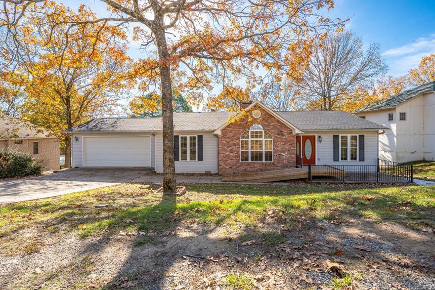 Comfortable handicap accessible home with large deck overlooking a serene setting of Diamondhead Golf Course. Ramp to front entrance and kitchen entrance through garage. Widened doorways, new paint and flooring upstairs.  Master bath remodeled.  New range, dishwasher, HVAC, barn doors, fence and so much more.