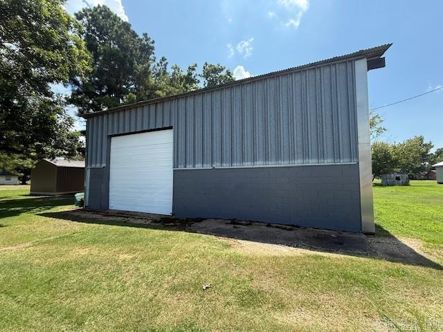 Unique Opportunity!! This property has 2 shop buildings to fit your needs with one built in 2024! New shop building is 16 x 24 the older and larger shop has approx. 18-20 ft walls in the front half of the building and 12' walls in the back half complete with 220 electrical. So much potential for this property!