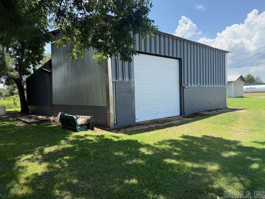 Unique Opportunity!! This property has 2 shop buildings to fit your needs with one built in 2024! New shop building is 16 x 24 the older and larger shop has approx. 18-20 ft walls in the front half of the building and 12' walls in the back half complete with 220 electrical.  So much potential for this property!