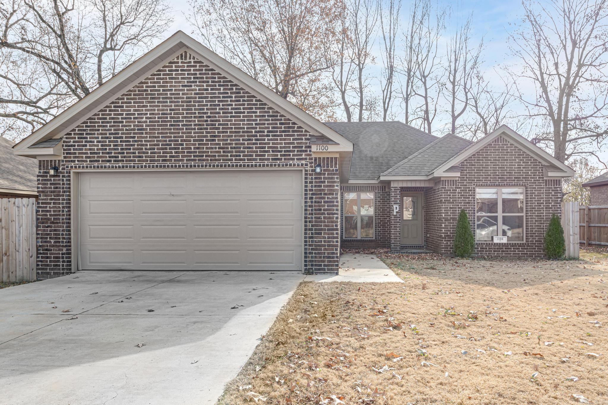 Discover the charm of this enchanting residence constructed in 2017, showcasing a delightful all-brick exterior complemented by a convenient 2-car garage. Step inside to reveal a tastefully designed formal dining area and welcoming foyer, seamlessly blending style and functionality. The walk-in laundry room adds a touch of convenience to your daily routine. Indulge in the luxury of the primary bedroom, adorned with a captivating tray ceiling, a beautifully tiled shower surround, and a spacious walk-in closet. Throughout the home, elegant granite accents elevate the overall aesthetic, promising a sophisticated and timeless appeal. Experience the perfect blend of modern comfort and classic elegance in this meticulously crafted home.