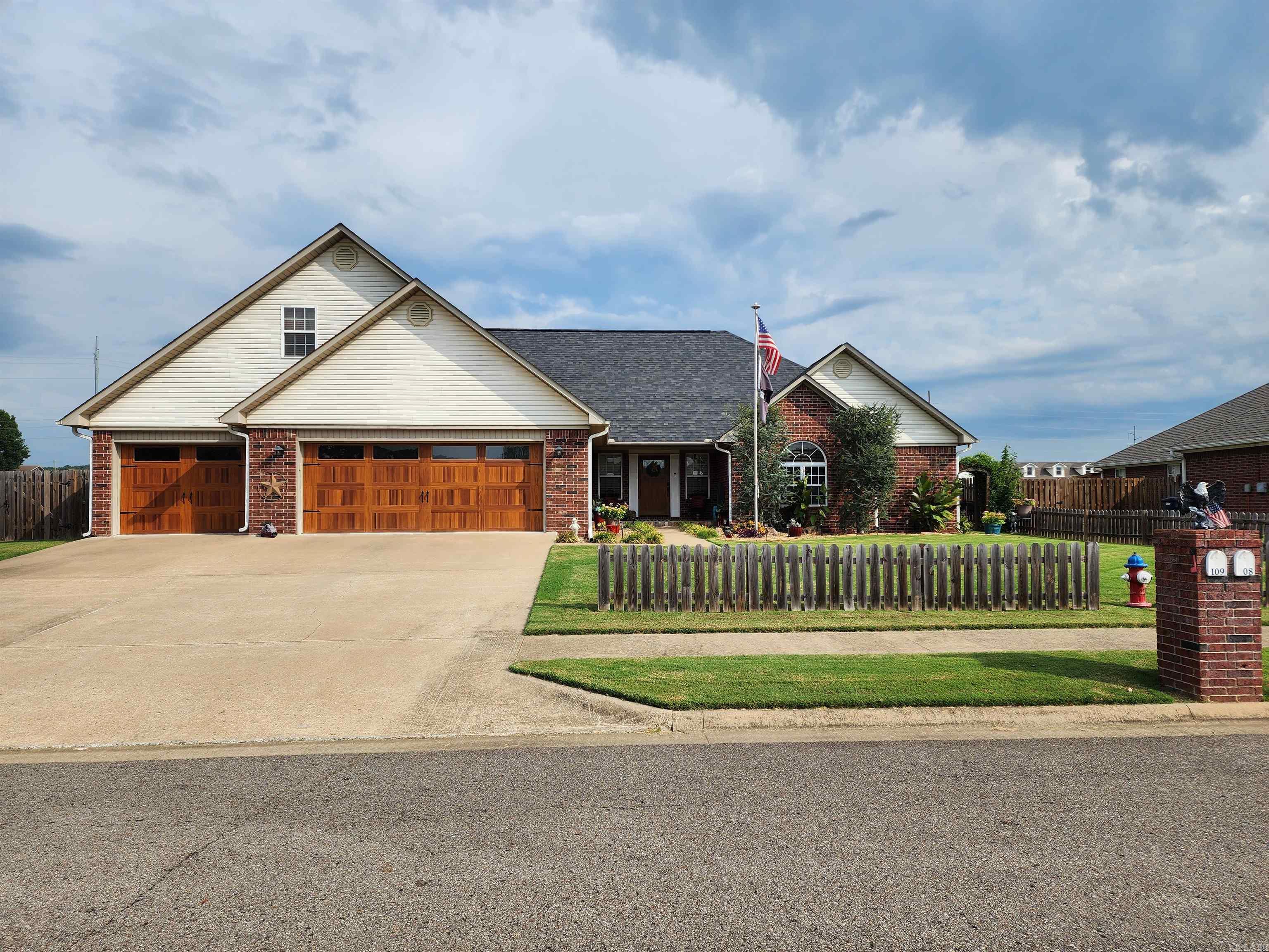 Amazing home in Stewart Place! 4 Bedrooms 2.5 baths, Beautifully designed and executed both inside and out! This is a must-see! Huge open living, kitchen and dining area, includes induction range, dishwasher and microwave all one year old, added bonus room off dining area that leads to a 15X30 patio, with a Barbeque area off that, and a private back yard. This home offers custom hardwood floors, granite countertops, 2 gas fireplaces, trays ceilings, and lots more! The master suite is large and has a beautifully updated master bathroom. How about a 3 car-garage, that great outdoor entertaining area and a storage building? This home is in beautiful condition and is move in ready! Call today to schedule your showing!