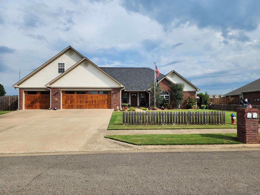 Amazing home in Stewart Place! 4 Bedrooms 2.5 baths, Beautifully designed and executed both inside and out! This is a must-see! Huge open living, kitchen and dining area, includes induction range, dishwasher and microwave all one year old, added bonus room off dining area that leads to a 15X30 patio, with a Barbeque area off that, and a private back yard. This home offers custom hardwood floors, granite countertops, 2 gas fireplaces, trays ceilings, and lots more! The master suite is large and has a beautifully updated master bathroom. How about a 3 car-garage, that great outdoor entertaining area and a storage building? This home is in beautiful condition and is move in ready! Call today to schedule your showing!