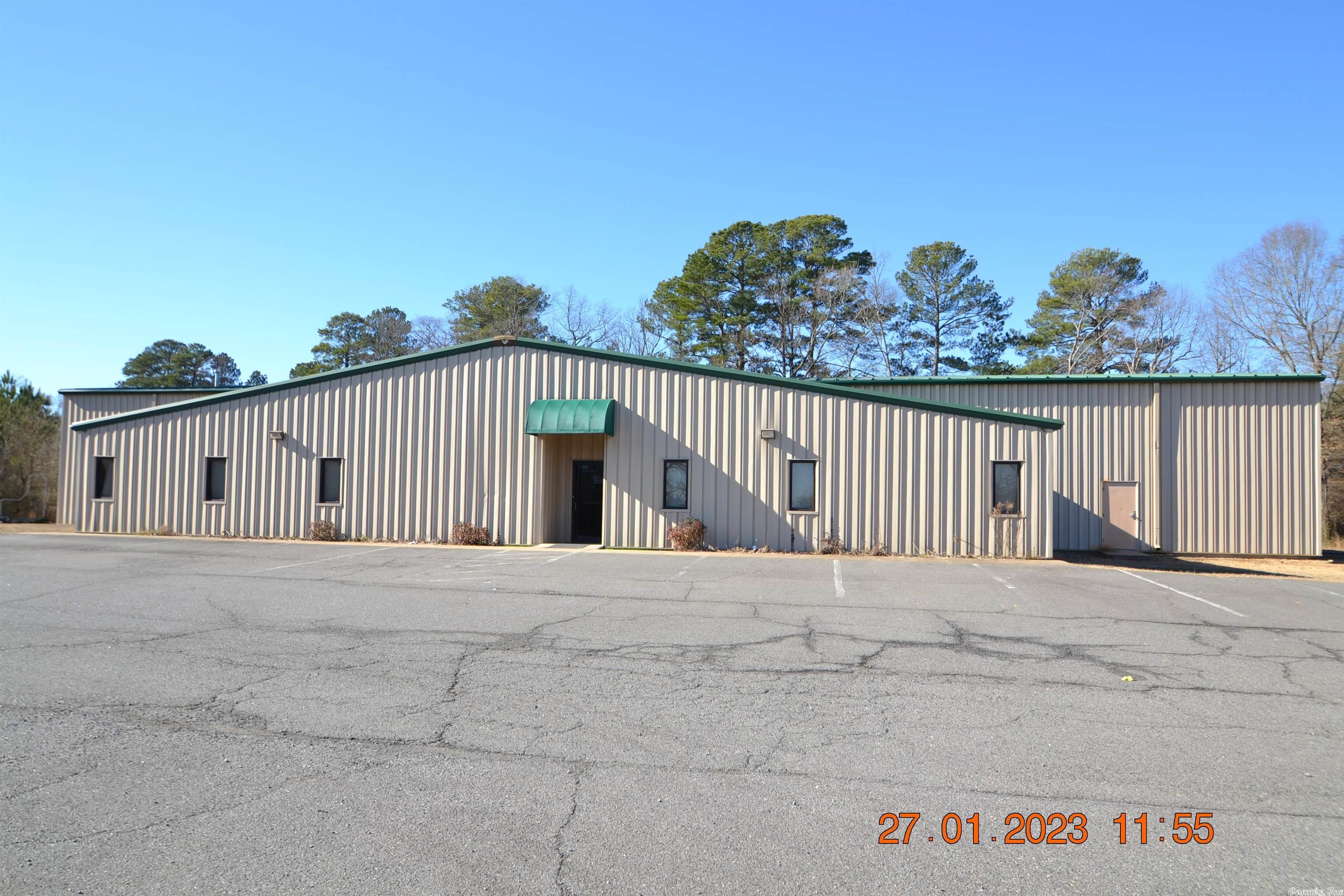 Desirable tract of level land ready for development. High visibility fronting Interstate 30 (approx. 311' frontage) and Highway 5 (approx. 450' frontage). Great location with lots of potential. Multipurpose steel building has approx. 14,595 sf w/offices, kitchen area, public restrooms & large open floor area. Storage area has overhead door. SEE AGENT REMARKS AND SHOWING REMARKS.