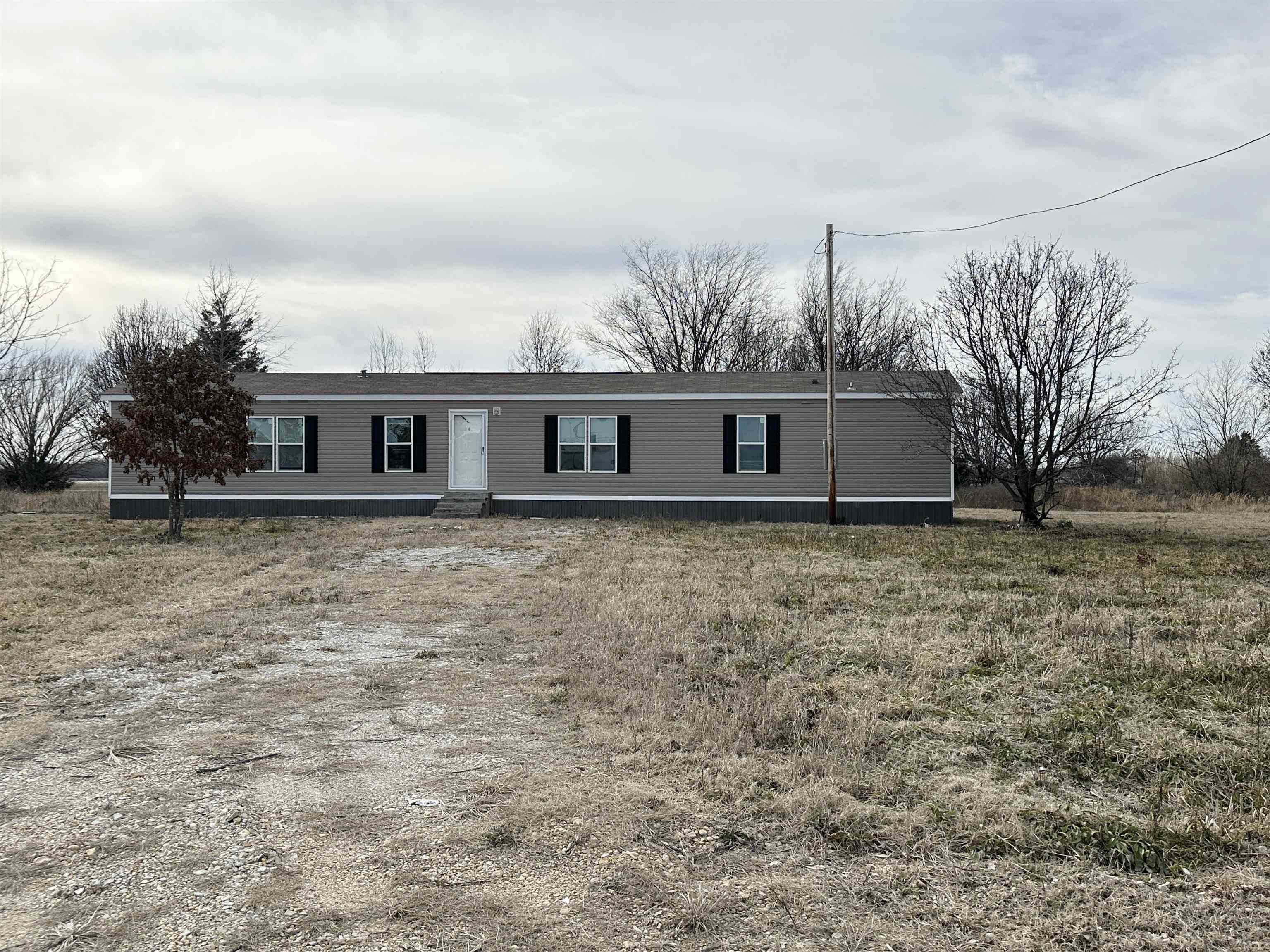 Escape to the perfect blend of comfort and space with this beautiful 3-bedroom, 2-bathroom manufactured home nestled on 2 private acres. Whether you're looking for a peaceful retreat or a place to grow, this property offers endless possibilities!