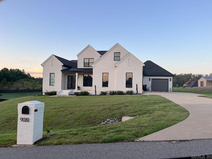 Amazing 2 story contemporary home located in the sought after community of Stonehill Estates. Bryant schools. Inground pool. 2,918 sq. ft. 4 bedrooms & office, 3 full baths, 3 car garage. This property sits at the top of a hill with an absolutely stunning view. Plenty of land for a shop. Open floor plan. Large garages, large acre lot and 2 attic spaces, give an abundant amount of storage. Security cameras. Custom upgrades & built ins. Large covered patios. Gas fireplace. This custom beauty is a must see!