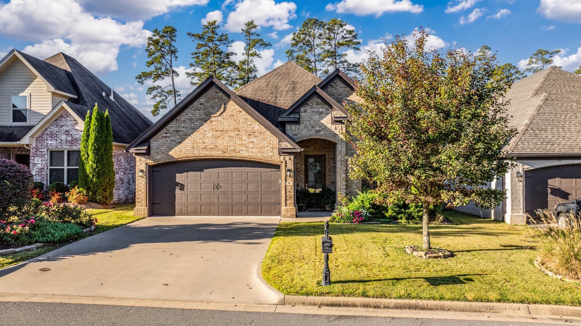 Imagine living in Chenal Valley Wildwood Place, this Stunning Move in Ready home has all the upgrades you would expect Plus Extend your living space with the heated & cooled sunroom (includ. in sq ft) Open Concept, Living room has trey ceiling, Formal dining room could be office, Retreat to your primary bedroom suite with soaking tub and walk in shower. Mud room with cabinets & Large laundry room w/sink & split floor plan as well as a formal dining room make this a true GEM. This one is a MUST SEE!! *SEE AGENT REMARKS
