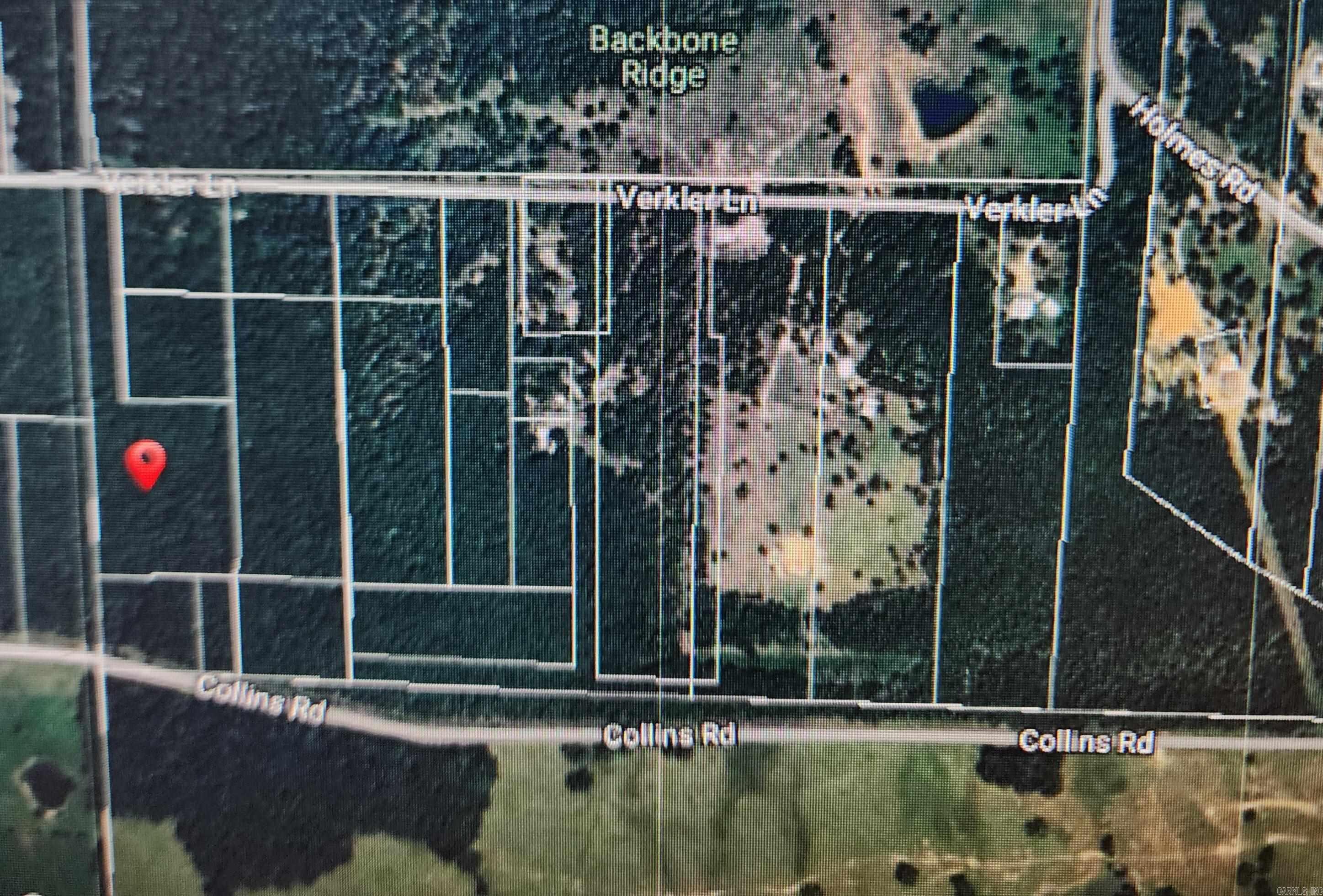 8.45-acre tract lot just NW of Searcy city limits. Easy access to Searcy High with 3 other directions to access Hwy 13 Bypass. Clear the trees you wish for your desired building spot & leave the rest for shade & privacy. Large homes on Holmes & Verkler around it but beautiful views overlooking the pastures & Searcy High School. Labeled Ad Tract "A" on photo. Seller retains all mineral rights.