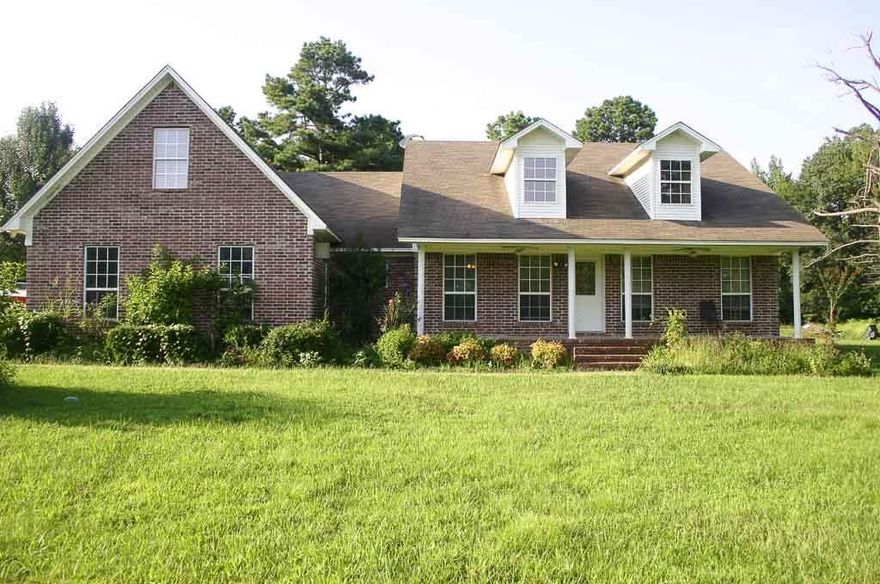 Beautiful home in a quiet country setting on over 14 acres. Home has a split floor plan. Lg master has surround sound. Master bath has Jacuzzi, sep shower, dbl vanity, & his & her closets. Living room is open to the kitchen & has gas fp, built-ins, & surround sound. The home has open layout w/ a breakfast bar separating the kitchen & living area. Kitchen has stainless steal appliances, gas stove, & pantry w/ a formal dinning room. The bonus room/4th br upstairs does have a closet & has 2000 carpet allowance