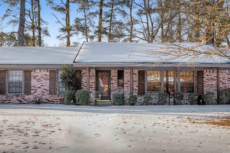 Experienced refined country living in this beautifully maintained 3 bedroom, 2 bath residence, perfectly situated on a picturesque, fully fenced lot! Designed with comfort in mind, this home features an open, light filled floor plan ideal for entertaining and every day living.  The expansive outdoor space offers privacy and serenity, creating a true retreat.  A generous new carpet allowance is offered at closing, allowing the next owner to customize finishes to their personal taste. This property blends timeless charm with modern comfort- exceptional opportunity for those seeking space, style and tranquility. Professional pics coming soon!