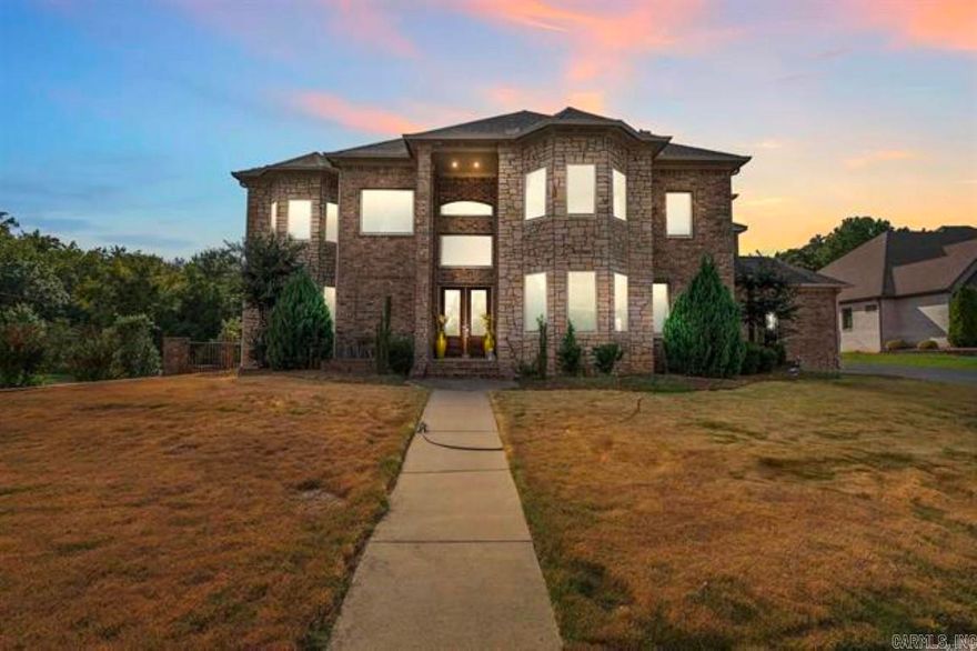 An absolute stunner!!! Come View This Exquisite 5 Bedroom & 6 Bath 2 Story Custom Built Home in North Little Rock. This Home Features a Light & Bright Open Floor Plan, Wide Hallways, 10' Ceilings, Home Theater & an Outdoor Patio With a Kitchen, Fireplace & Half Bathroom. The Upstairs has An Additional Large Enclosed Patio Perfect for Flex Space. The Home is Equipped With 20 Seer Ac Units & Additional Foam Insulation.