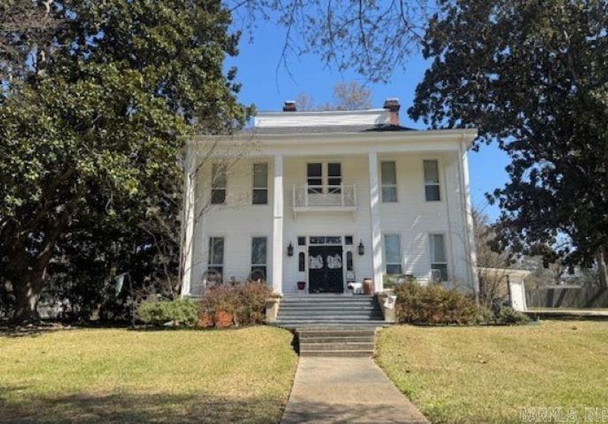 Located in the beautiful and historic North Main Street area, this stunning home blends timeless character with thoughtful modern updates. Offering 4 bedrooms upstairs and the possibility of a 5th downstairs, 2 full bathrooms with claw foot tubs and a half bath, and 3,784 sq ft of living space, it provides room for a large household and plenty of areas for entertaining. The spacious kitchen was remodeled in 2009 and features tile flooring, a convenient work island with seating, and a 5-burner gas stove. A majestic staircase leads to the second floor, where you’ll find four bedrooms including the primary suite, also updated in 2009. Major improvements include a new roof in 2018 and a downstairs HVAC replacement in 2017 (upstairs unit age unknown). As summer approaches, enjoy cooling off in the above-ground pool with surrounding deck. This home is full of charm, space, and modern comfort. A must-see!