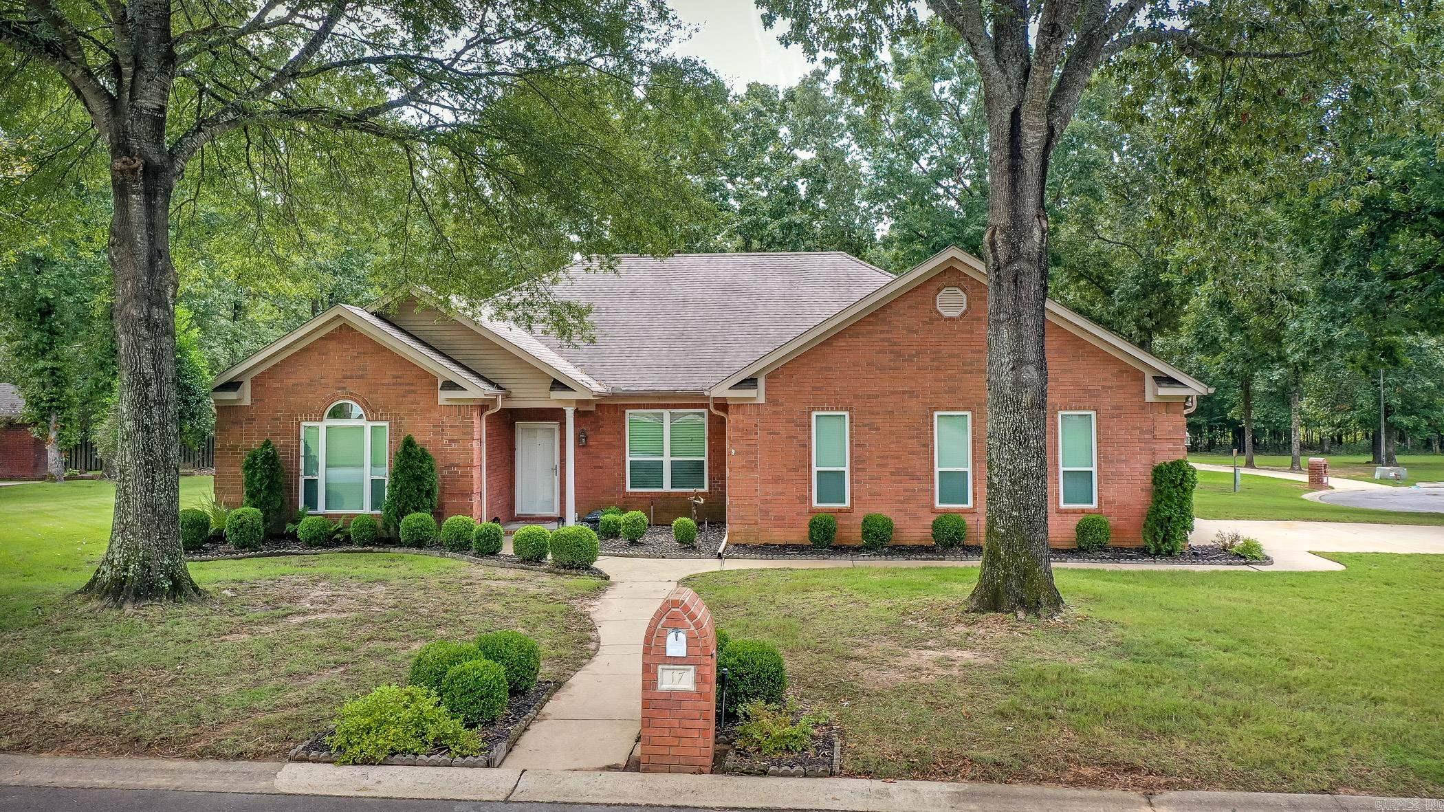 Feel right at home as you drive into low traffic area of Greystone! Tree shaded yard for summertime shade. Walk into comfortable living and dining space with hand scraped wood flooring. Enjoy cooking with updated oven 2024, microwave 2024 and dishwasher accented with easy care granite counters and backsplash. Plenty of cabinetry for all your meal planning and cookware. Enjoy 4 bedrooms and 3 full baths plus a separate office with exterior door. Guest room is perfect with private bath. Spacious primary bedroom features ceiling feature. Stroll into bath area with 2 walk in closets and double vanity space plus jetted tub and walk in shower with new smoked shower door. Soft colors throughout for warm atmosphere to relax and enjoy life! Yard has sprinkler system also! Roof replaced in 2016 and HVAC replaced in 2020. See docsonline for disclosure.