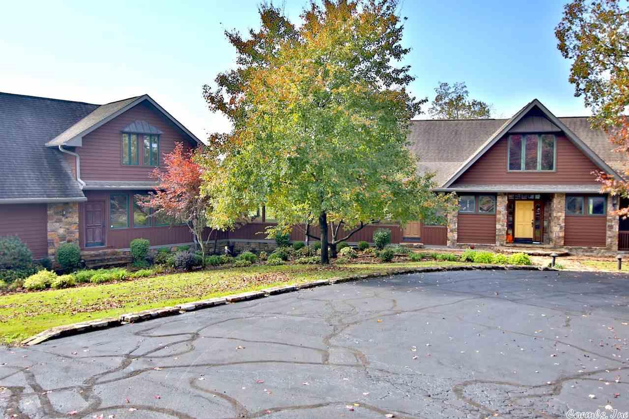 Ozarks Premier River Ranch - 452 acres, Custom built home with approx. 5,700 sq. ft. living area including guest quarters. Views of the farm from each room. 4 bdr., 4 1/2 bath, large covered porches, 2 car garage, custom kitchen with granite counters, 5 fireplaces, jacuzzi bath, sauna, walk in closets. Approx. 1 1/2 mile of river thru the property, approx. 330 acres of pasture and hayland, 2 large springs, 6 ponds, 120 acres of woods with prime hunting, corral, fenced & cross fenced. Very private setting.