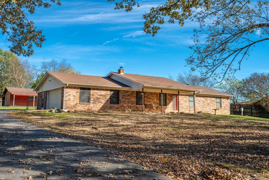 Located in the peaceful Cleveland Shores Subdivision, just 100 yards from Lake Hamilton, this spacious home offers a huge lot with a fenced backyard, large shop/storage, and a 2-car attached garage. Inside, enjoy the large living area, with a wood stove, sunroom, and a large master bath featuring a double spa tub. This is a 3 bedroom 2 bath with an added bonus room. New roof as of June 2024. Highly rated Lakeside schools nearby. A perfect blend of tranquility, space, and convenience, with lake access just seconds away!