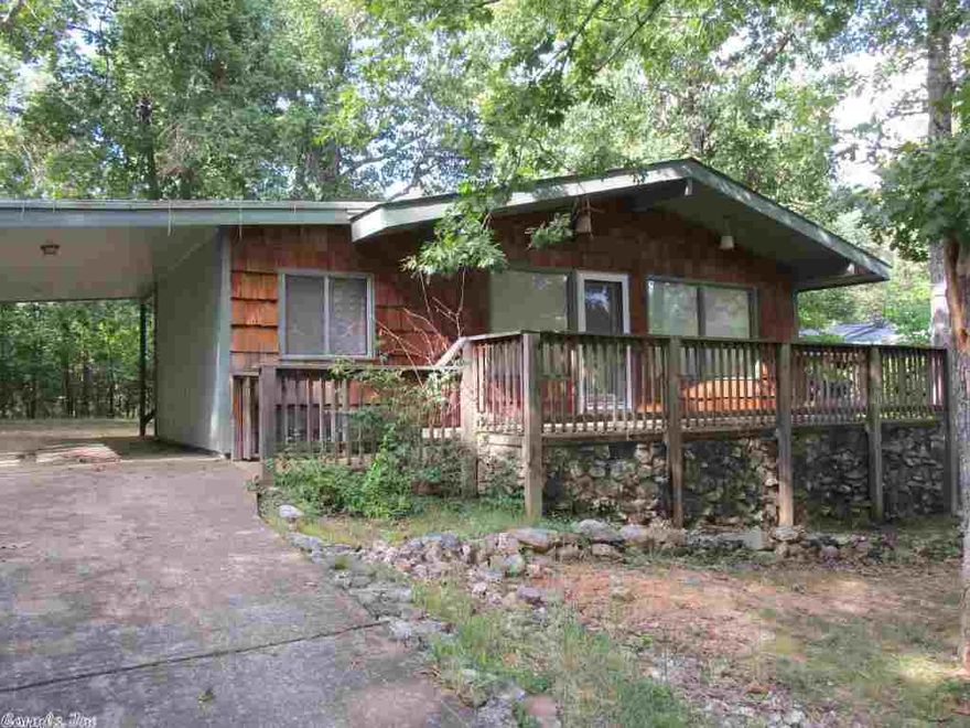 Owner Financing Available! This home offers 2 bedrooms, full bath, living room, hardwood floors, wood burning stove, nice sized storage room, flat backyard and located close to the Cherokee Village Town Center. Owner financing available to qualified buyer.