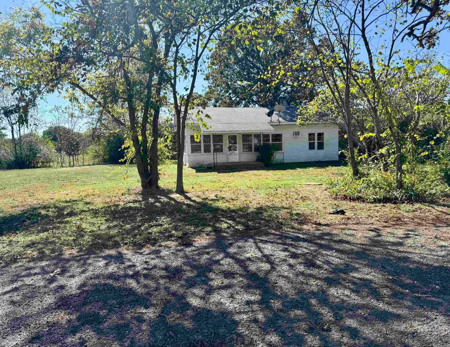 Discover the potential in this cute and affordable 2-bedroom home sitting on over half an acre. Featuring real hardwood floors and plenty of character, this property is ready for your personal touch and updates. Located in the desirable Old Military Road area, this home sits on a newly surveyed lot and is being sold as-is, offering a great opportunity for investors, first-time buyers, or anyone looking for a project with plenty of promise!