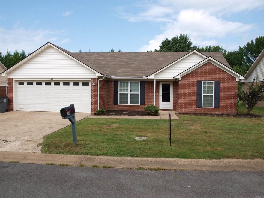 Nice 3 bed/2 bath brick home is located less than 1 mile North of downtown Searcy, but has a great country feeling!  Close to walking/biking trails and beautiful wooded land is just behind the home. This brick home features a split bedroom plan with a walk-in master closet off of the master bath, vaulted ceilings in the spacious living room will make you feel comfortable, and an outdoor storage building comes with the house for your mower and other outdoor tools/equipment.  There have been several updates in recent years including beautiful luxury vinyl floors installed in 2022, new roof in 2019, new privacy fence installed in 2020, new cook stove was added in 2022, and insulation was added in attic over garage in 2023.  This home qualifies for a 100% financing RD loan through your mortgage company.  This home is not expected to last long on the market so call today to schedule your showing!  Agents please see showing/agent remarks.
