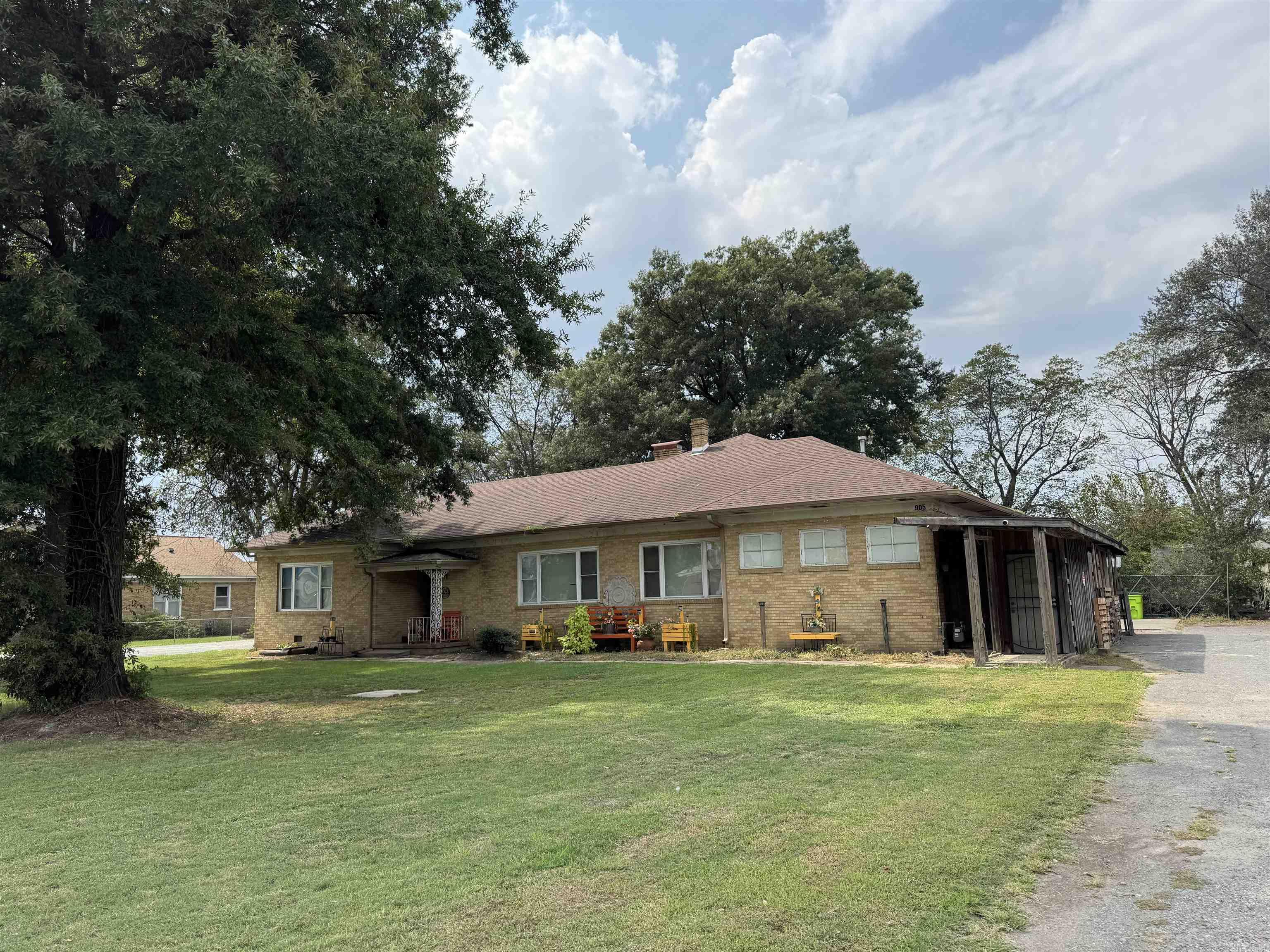 Spacious 3-bedroom, 2-bathroom site-built brick home with approximately 3,100 sq. ft. of living space. This home features generously sized rooms, including a large kitchen perfect for family gatherings. Sitting on a shaded lot, the property offers plenty of outdoor space along with a large shop in the back for storage, hobbies, or projects. With its size and layout, this home provides ample room for a large family to spread out and enjoy.