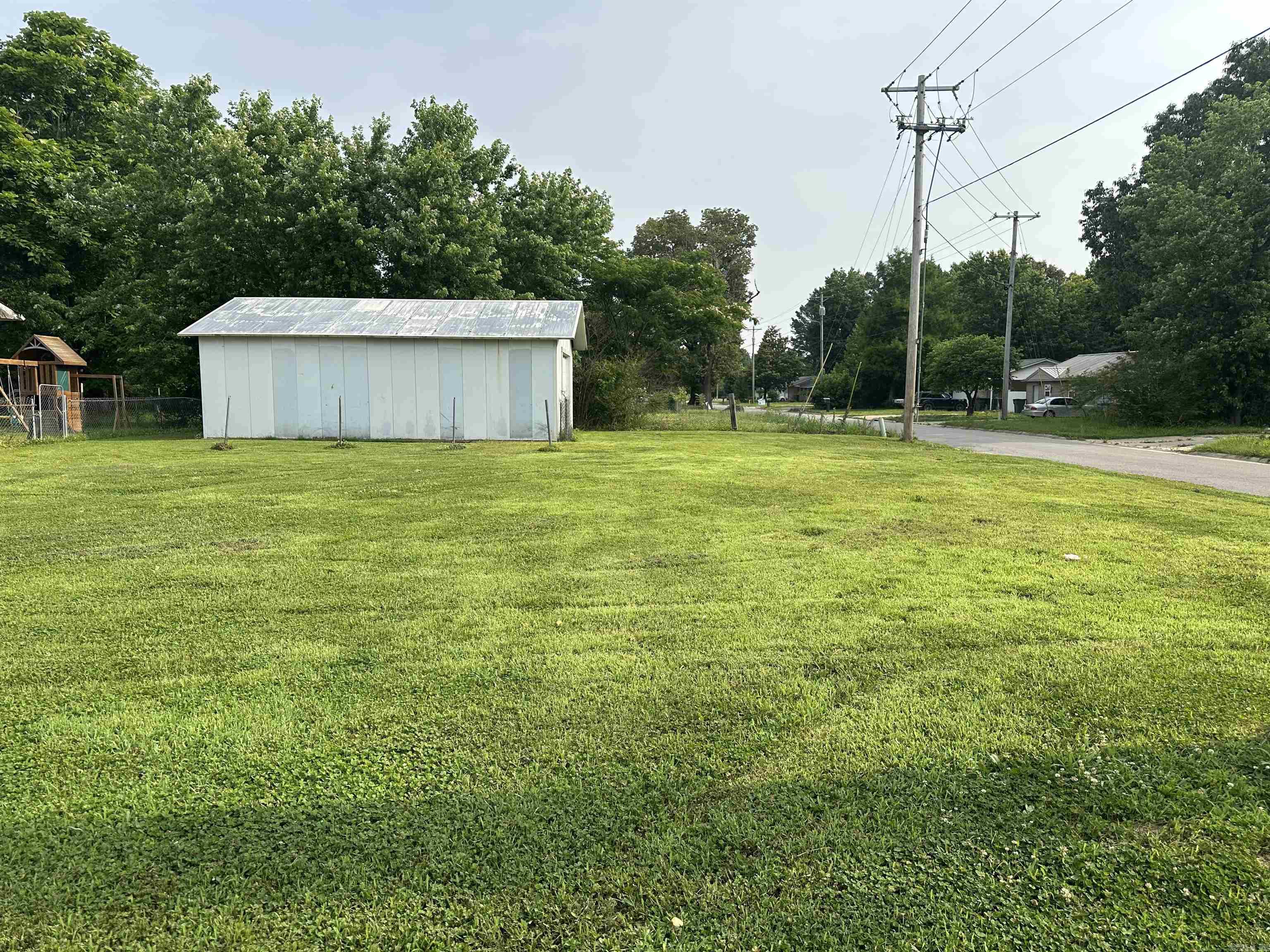 Welcome to an incredible opportunity to own a double corner lot to build your custom dream home on! This property already has a garage/shop on-site, perfect for variety of uses, whether you're looking to store equipment or set up a workshop. This double lot presents endless possibilities.