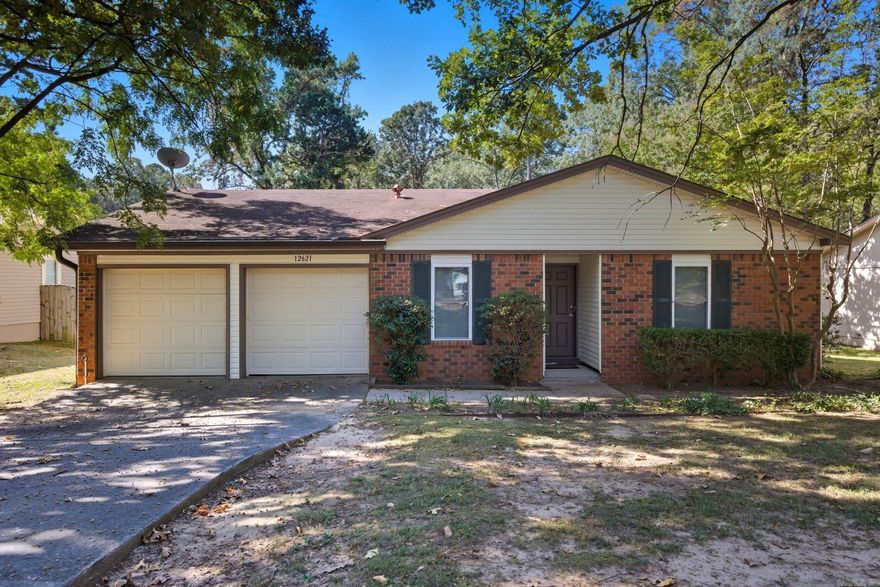 Charming Little Rock Home – Move-In Ready!  Welcome to 12621 Valleywood Drive, a 3-bedroom, 2-bath home in the desirable Timber Ridge subdivision. This single-story home offers approximately 1,366 square feet of comfortable living space with a functional floor plan and timeless appeal. The inviting living area features a cozy wood-burning fireplace, ideal for relaxing evenings. The kitchen comes equipped with a full appliance package, including a refrigerator, dishwasher, and electric range.  Step outside to enjoy a spacious fenced backyard and a covered patio. Additional highlights include a 2-car garage, slab foundation, central heat and air, and easy-care landscaping on a 0.20-acre lot.  Located just minutes from Walmart, Sam’s Club, Lowe’s, and local dining, this home blends comfort and convenience in one of Little Rock’s most convenient neighborhoods. Whether you’re a first-time buyer, downsizing, or looking for a solid investment, this move-in ready home checks all the boxes.  Don’t miss your chance to make 12621 Valleywood Drive your new home!