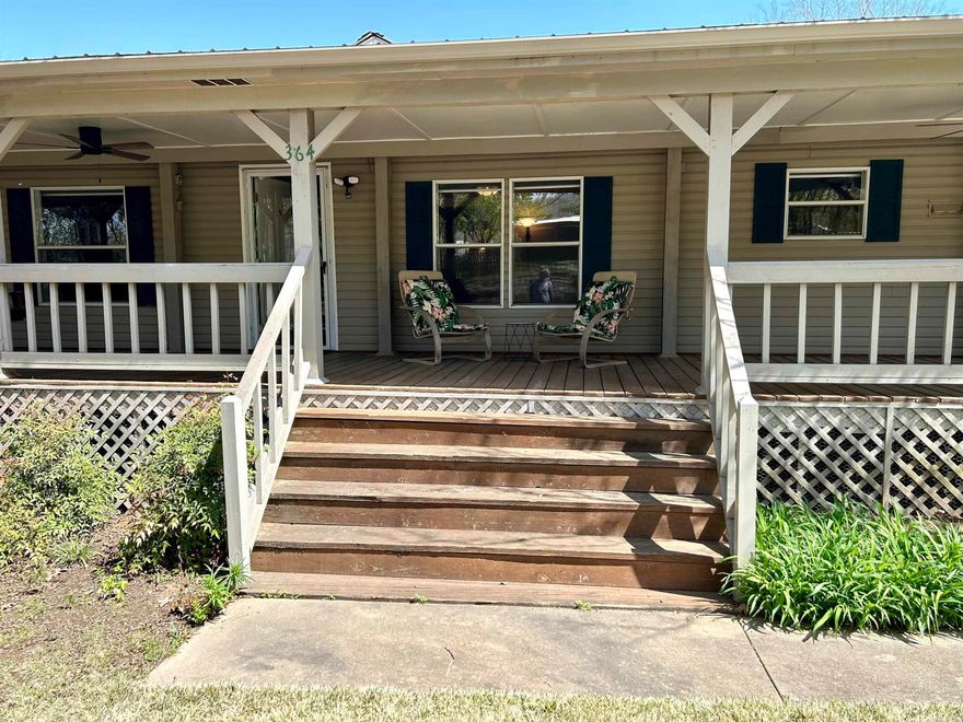 This home checks the boxes for convenient country living!     - Well maintained 3 bedroom, 2 bath home  - 1.67 acres  - 1 mile to the Courthouse Square  - 24 x 36 foot shop building  - 2 car carport with additional storage  - Covered RV storage  - Additional RV parking pad with hookups  - Small storage building or future "she shed"  - New roof on house and shop in 2024  - New luxury vinyl plank floor throughout  - New countertops  - New appliances  - All appliances including refrigerator, washer and dryer convey  - Large, wrap around porches for outdoor relaxing and entertaining  - Beautiful landscaping with lots of room for a large garden, chickens, and even   another critter or two.  - Unrestricted, just out of city limits.   -   This is a truly wonderful property from which to enjoy all that Mountain View and the Ozark Mountains have to offer!
