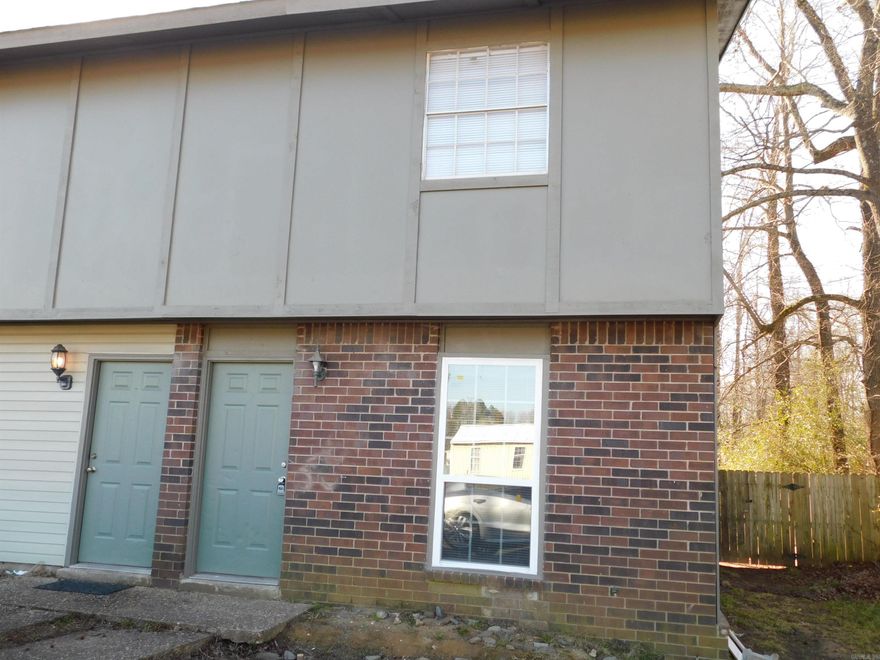 Super nice townhouse, newly remodeled interior, large 2 Br, 1 & 1/2 bath home in a small quiet complex. Beautiful finishes, new hard surface floors, nicely furnished kitchen, W/D conn., HVAC, ceiling fans, plenty of storage, private patio, large back yard, off street parking. Call Marshall Peters & Associates 501-414-8340