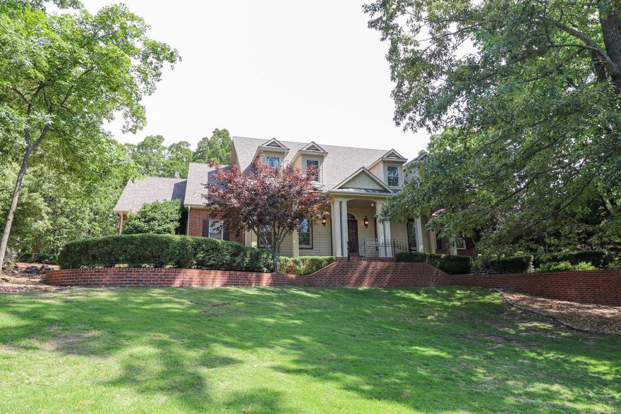 Welcome to this exquisite 5-bedroom, 3.5-bath home near the Ridgepointe clubhouse, swimming pool, tennis courts, and golf pro shop. This residence is a sanctuary of comfort and sophistication, boasting high-end features and modern conveniences. The spacious layout includes a versatile front living room, perfect for an office or bedroom, and a large separate dining room. Equipped with a sophisticated security system featuring 4 Ring cameras, a Ring doorbell, and motion-activated floodlight cameras, this home ensures peace of mind. Enjoy high-quality audio throughout with the built-in Surround Sound music system. The Gilmore custom kitchen is a chef's dream, with a breakfast bar, large table area, and walk-out to the screened patio. It includes a SubZero refrigerator/freezer, Viking gas range with warming shelf, electric wall oven, microwave, built-in icemaker, and Butler's pantry, ideal for gourmet cooking and entertaining. The insulated 3-car garage has a separate HVAC system for added comfort. The roof shingles were replaced about two years ago. Outdoor features include an invisible pet fence and attractive ironwork fencing around landscaped beds and the front entrance.