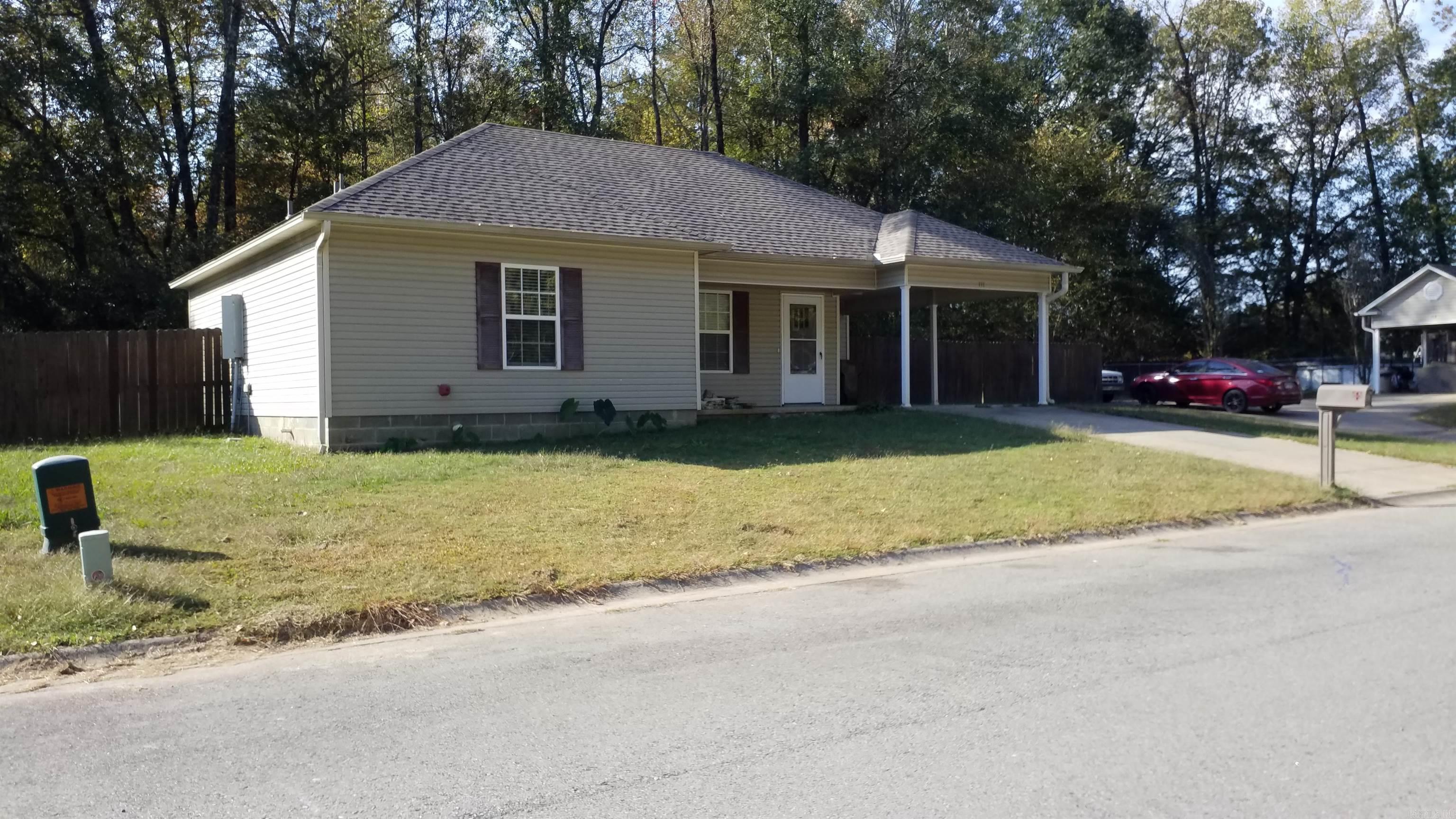 Perfect for 1st time home buyers! RD/FHA/VA. This adorable 3BR/2BA is located on a quiet street w/no thru traffic. It was updated less than a year ago. New faux wood ceramic tile throughout; laid in a stylish herringbone pattern. Fresh paint, granite counters, custom tub & shower enclosures, light fixtures & more! Spacious floorplan. Big, fenced back yard. Concrete pavers in back are covered by a wood parabola; great spot for outdoor entertaining! Don't miss out.. both the storage building & refrigerator conveys with property! Call to schedule a showing today.