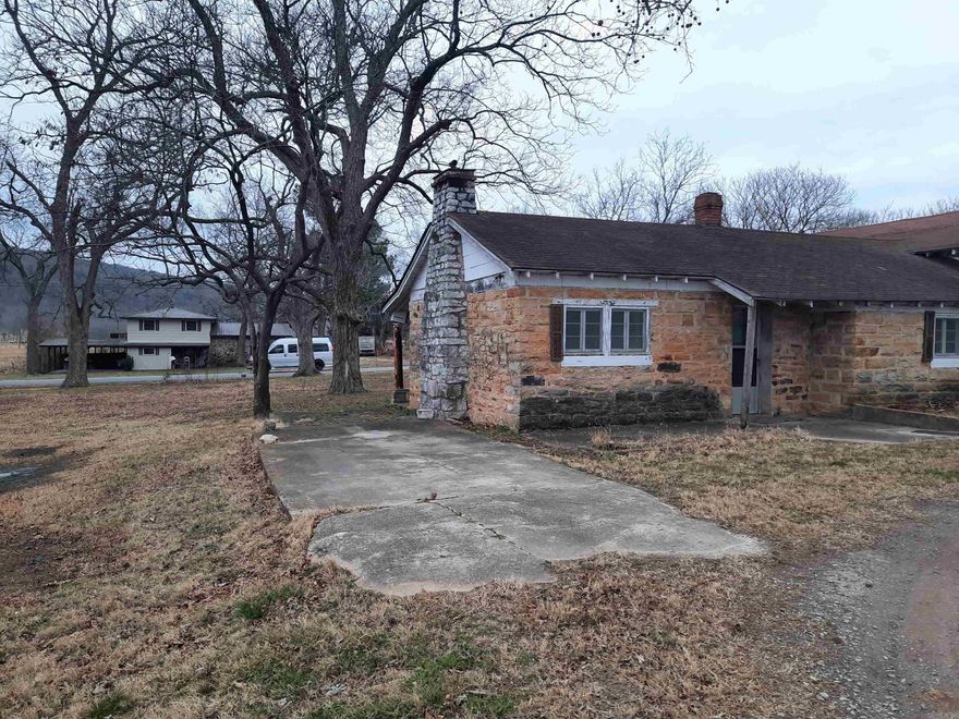 Location, Location, Location !  Looking for a great commercial location or just a great location to enjoy the wonderful Mountain View area.  Hard to find 1.5 acres of commercial property with-in easy walking distance of famous Court Square, the picking park, shopping and restaurants.  Take a look at this one, lays good, city utilities, fronts on two streets, has old home on site. This is a perfect location for many types of businesses, or a very beautiful tree shaded lot to build on.